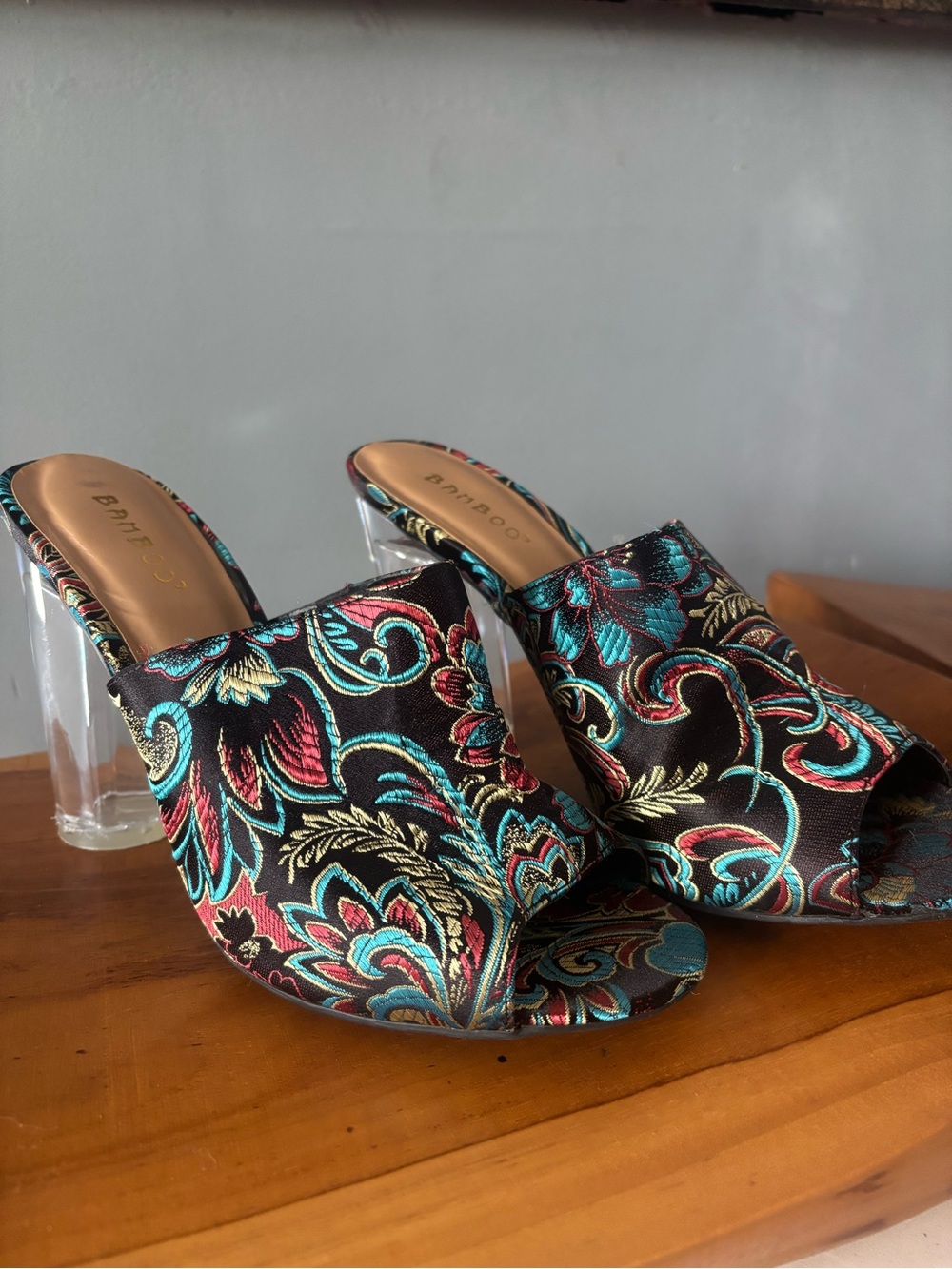 BAMBOO Black Floral Embroidered Open-Toe Mules with Clear Heel and Teal Accents
